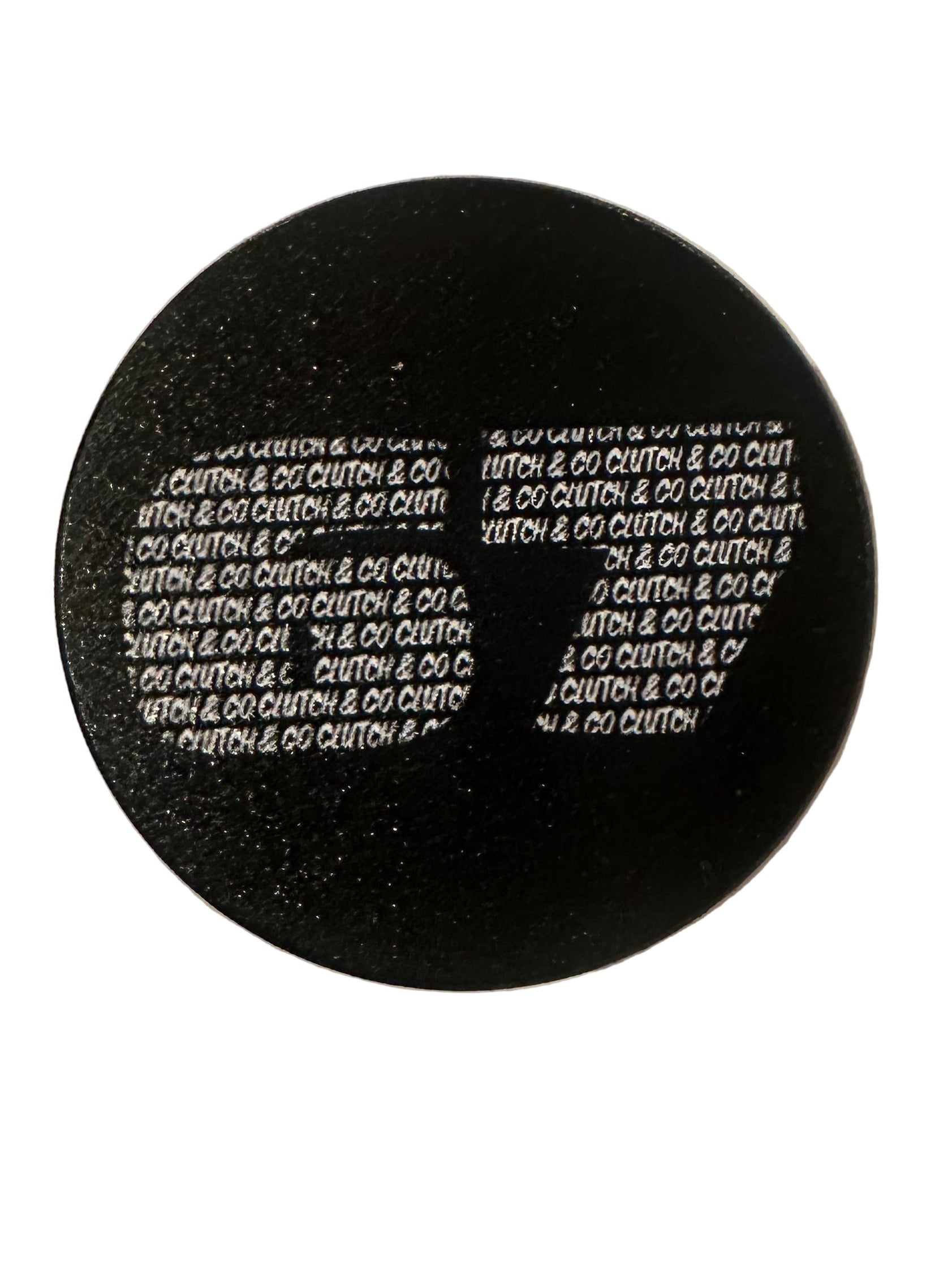 Black circular phone pop with white Clutch and Co text on a black background